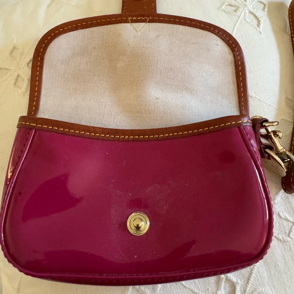 Dooney & Bourke Red and Brown Leather Wristlet with Gold Accents